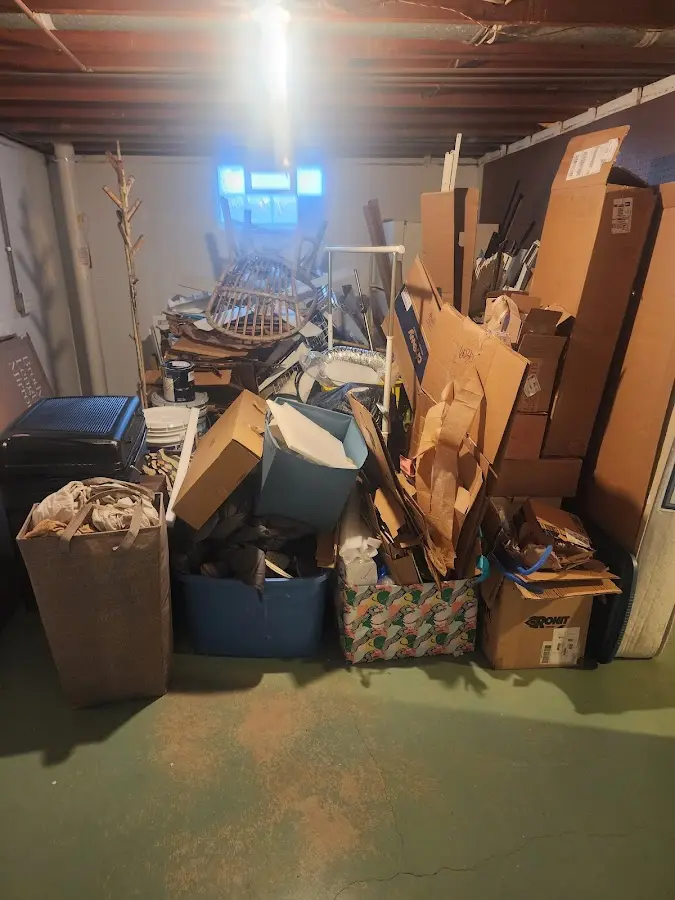 Roll-off dumpster container at job site for 2 Yard Dumpster Rental in Brookside